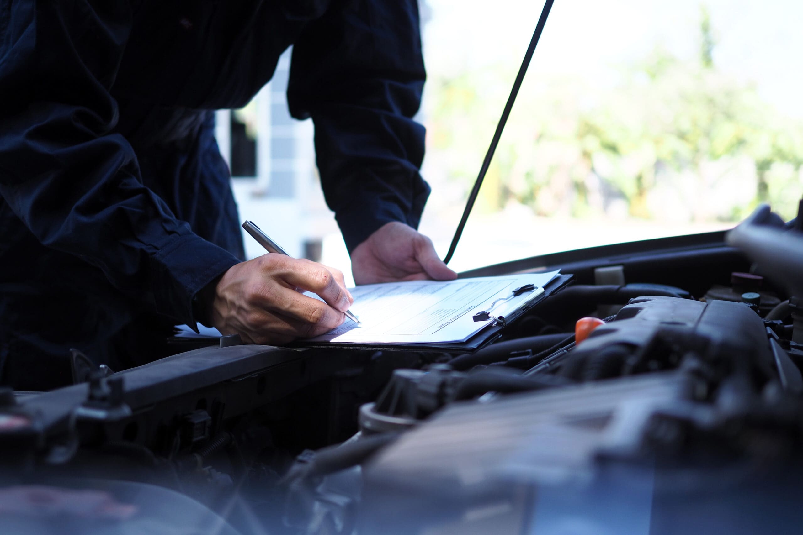 The engine engineer is checking and repairing the car. Off-site care services