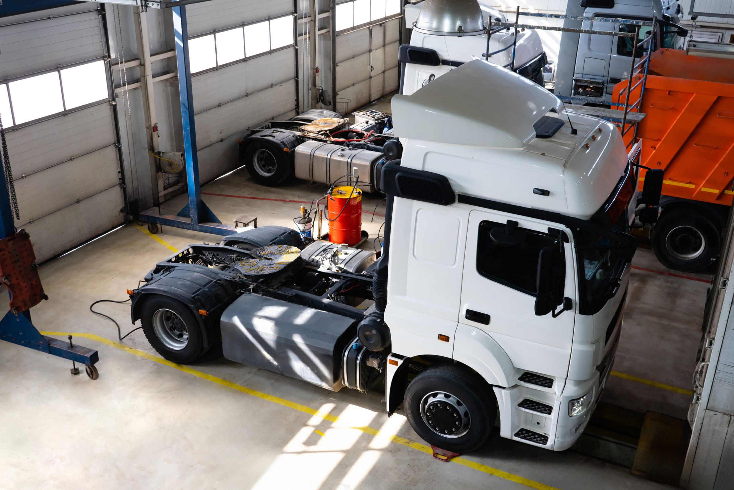 Truck repair in garage service.
